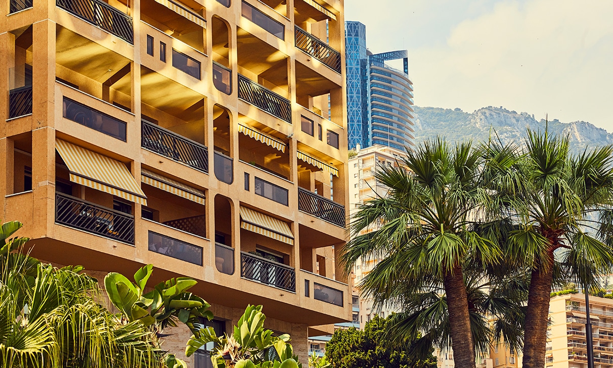 Exterior shot of Houston Palace, emphasizing its unique integration into Monaco’s luxury real estate skyline.