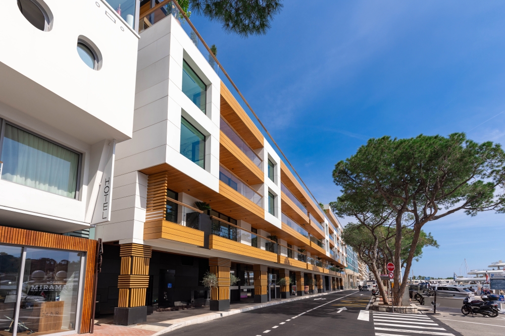 Luciana Monaco building exterior with luxury apartments and stunning sea views.