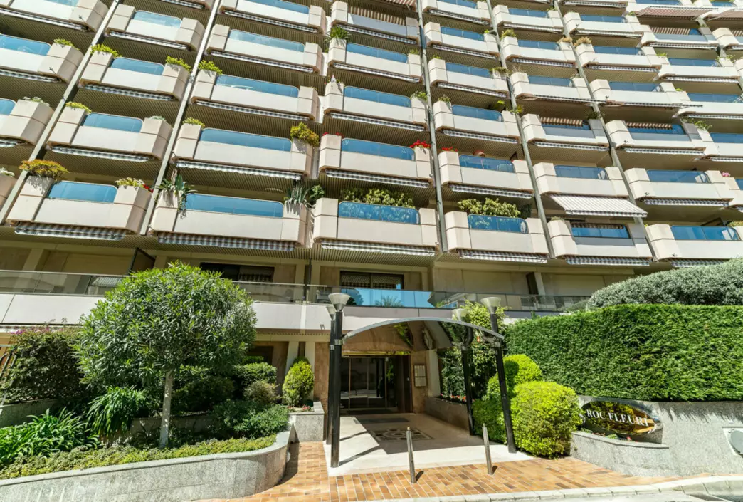 Exterior view of Roc Fleuri Monaco, a luxury residential building with stunning sea views and elegant design.