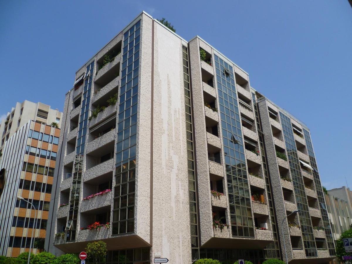 Exterior view of Le Suffren building in Monaco’s La Condamine district, showcasing modern architecture.